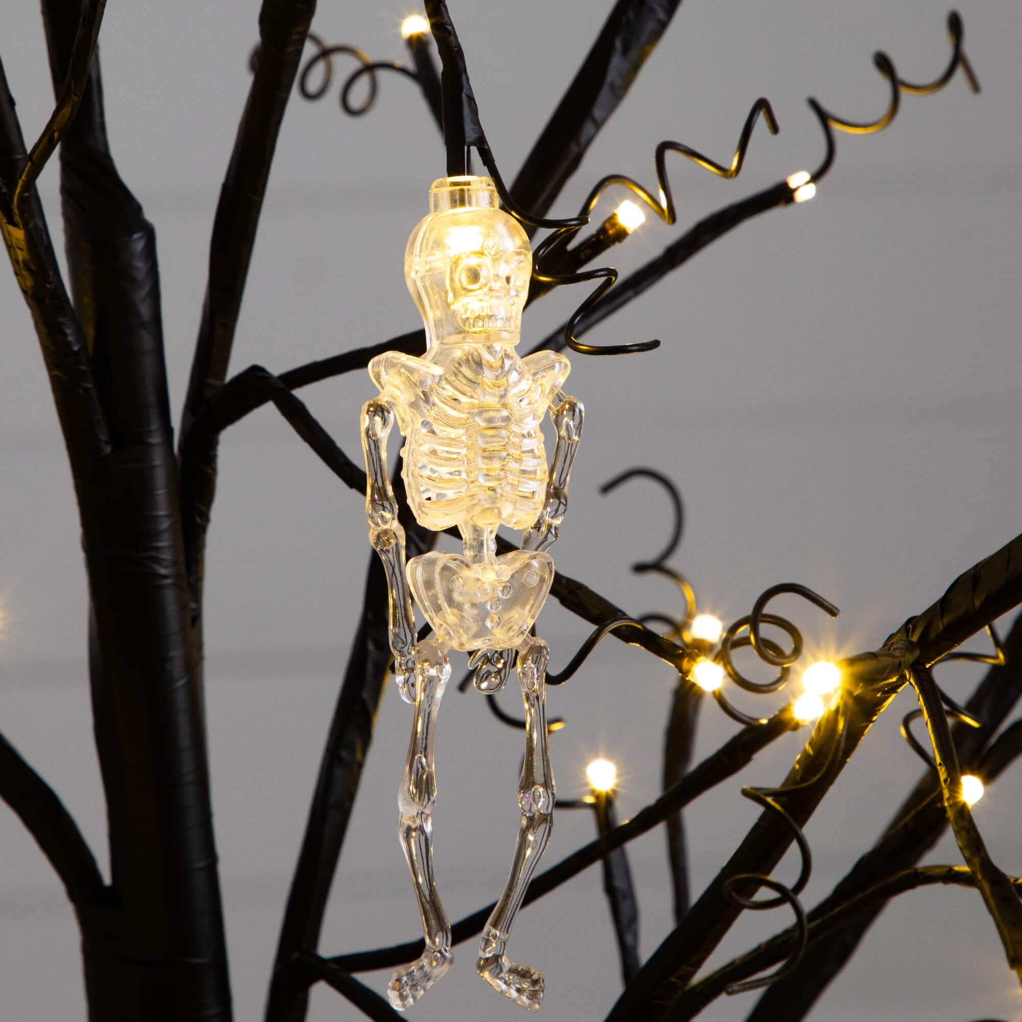 5ft. Pre-Lit Artificial Halloween Pumpkins and Skulls Ornament Tree with 72 Warm White LED Lights